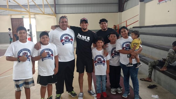 The Kids with Belizean Athlete Albert Morales